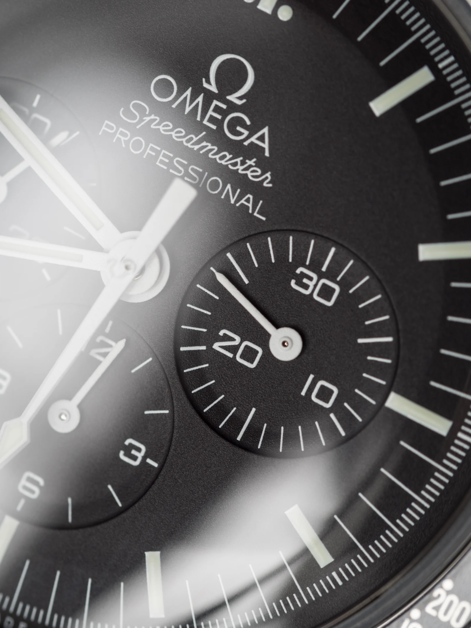 Macro photograph of the Omega Speedmaster Professional Moonwatch ref. 311.30.42.30.01.005 black dial
